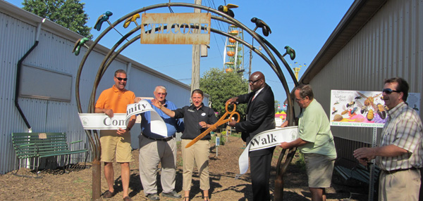 SWCD Chairman Tony Ekovich, La Porte County Fair Manager Gene Shurte, SWCD Education Coordinator Nicole Messacar, La Porte County Commissioner Willie Milsap, SWCD Supervisor Don Lode and Duane R. Arndt, Special Assistant to Rep. Joe Donnelly, Sr., at the July 12, 2012 ribbon-cutting.
